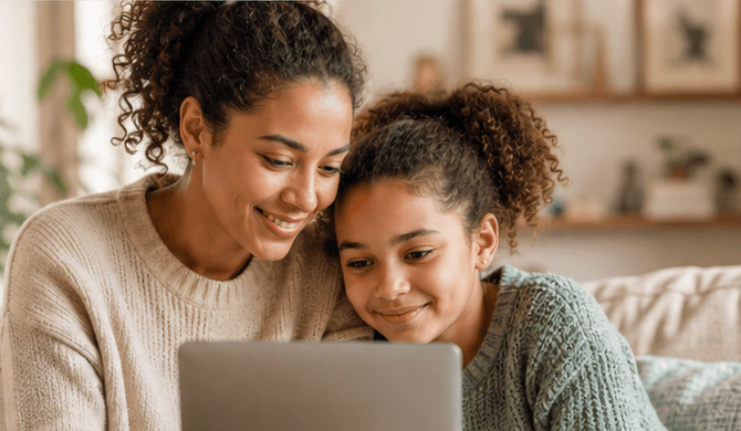 A parent and child reviewing privacy choices on a laptop